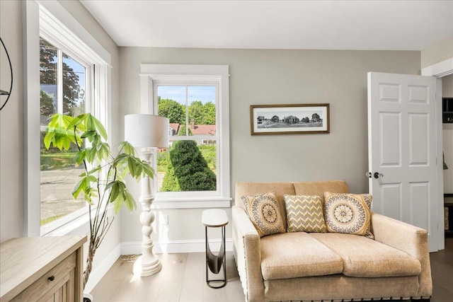 48 Ocean St, Belfast, ME 04915 - living area featuring baseboards and wood finished floors