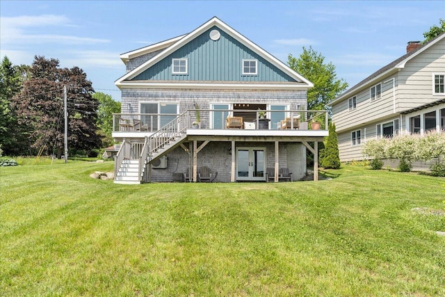48 Ocean St, Belfast, ME 04915 - back of house featuring a wooden deck, french doors, a lawn, and board and batten siding