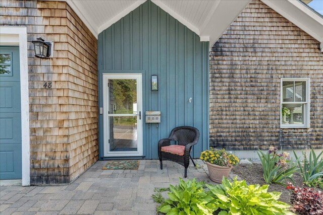 48 Ocean St, Belfast, ME 04915 - view of exterior entry featuring board and batten siding
