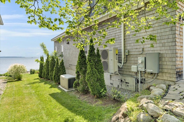 48 Ocean St, Belfast, ME 04915 - view of side of home with a water view and a yard
