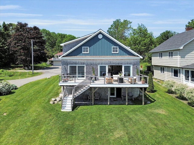 48 Ocean St, Belfast, ME 04915 - rear view of property with stairs, a yard, and a wooden deck