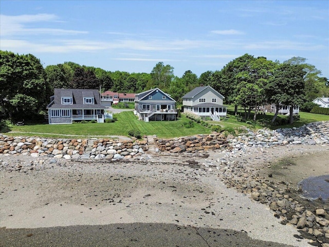 48 Ocean St, Belfast, ME 04915 - back of property with a lawn