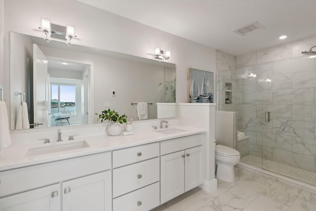 387 Commercial St Unit 527, Portland, ME 04101 - bathroom with marble finish flooring, a stall shower, double vanity, and recessed lighting