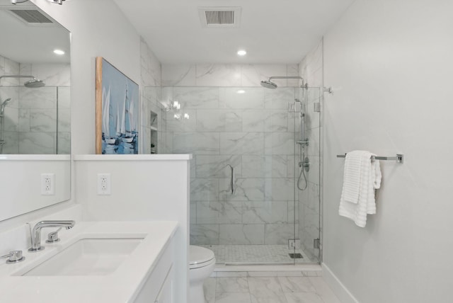387 Commercial St Unit 527, Portland, ME 04101 - bathroom with marble finish flooring, a shower stall, recessed lighting, and vanity
