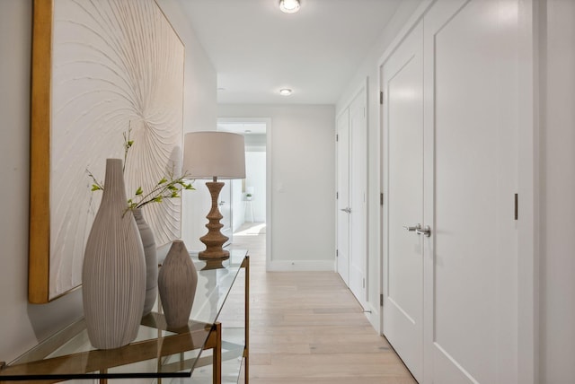 387 Commercial St Unit 527, Portland, ME 04101 - corridor featuring light wood finished floors and baseboards