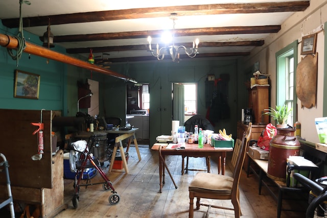 95 Wiley Rd, Greene, ME 04236 - below grade area with wood-type flooring and a chandelier