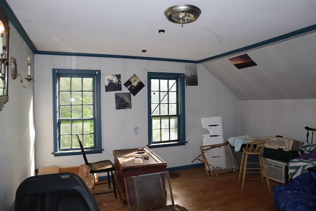 95 Wiley Rd, Greene, ME 04236 - bedroom with wood finished floors, vaulted ceiling, crown molding, and baseboards