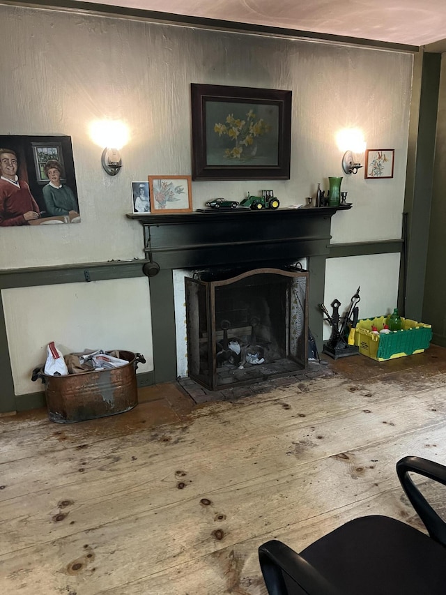 95 Wiley Rd, Greene, ME 04236 - detailed view of a fireplace with flush hearth and wood finished floors