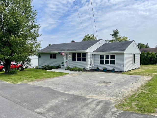 10 Crawford Dr, Bath, ME 04530 - ranch-style home featuring asphalt driveway, a front yard, a shingled roof, and a chimney