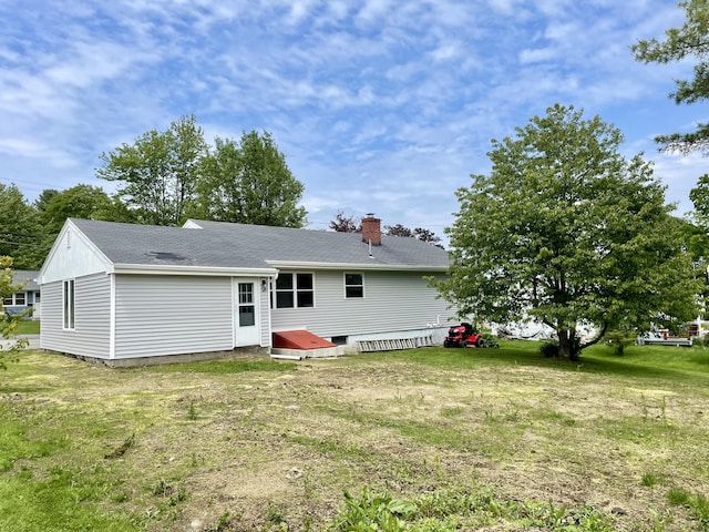 10 Crawford Dr, Bath, ME 04530 - rear view of house with a yard, a chimney, and roof with shingles