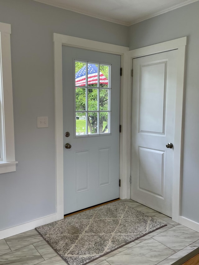 10 Crawford Dr, Bath, ME 04530 - doorway featuring crown molding, baseboards, and light marble finish floors