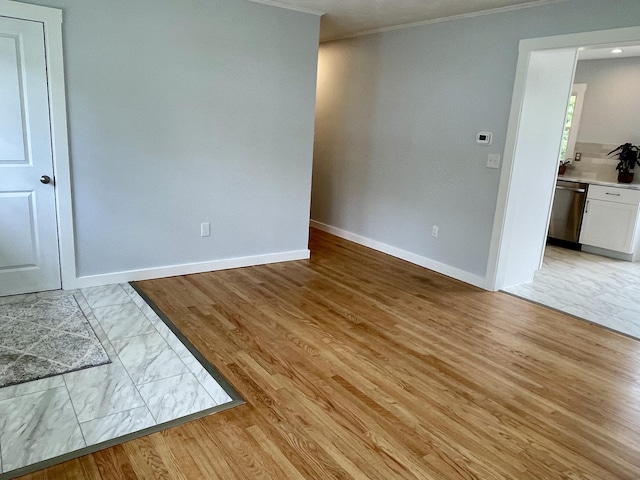 10 Crawford Dr, Bath, ME 04530 - unfurnished room with ornamental molding, baseboards, and light wood-style floors