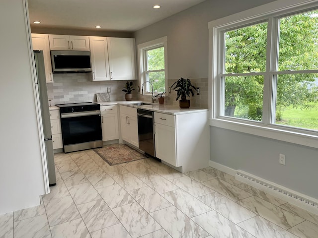 10 Crawford Dr, Bath, ME 04530 - kitchen featuring appliances with stainless steel finishes, a sink, plenty of natural light, a baseboard heating unit, and recessed lighting