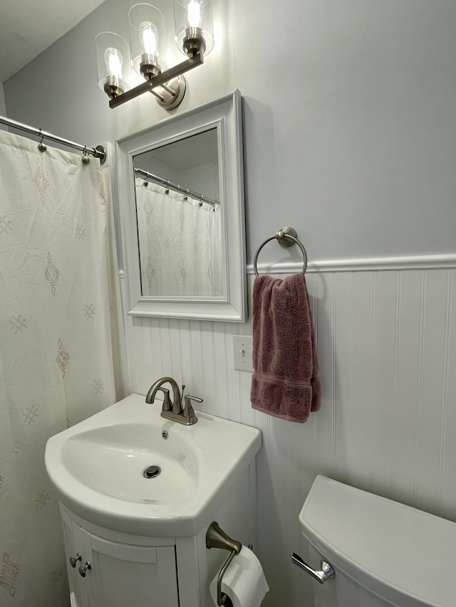 10 Crawford Dr, Bath, ME 04530 - full bathroom with toilet, a chandelier, and vanity