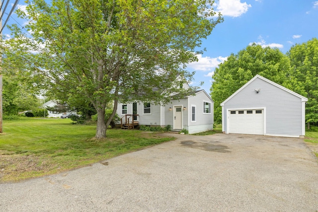 156 Lebanon Rd, North Berwick, ME 03906 - obstructed view of property featuring a garage, an outbuilding, driveway, and a front yard