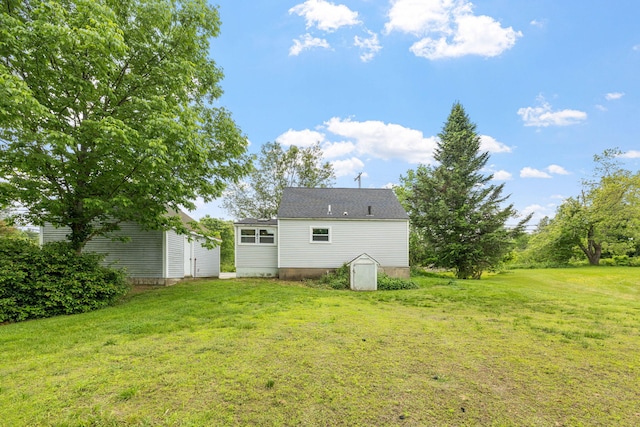 156 Lebanon Rd, North Berwick, ME 03906 - rear view of property with a lawn