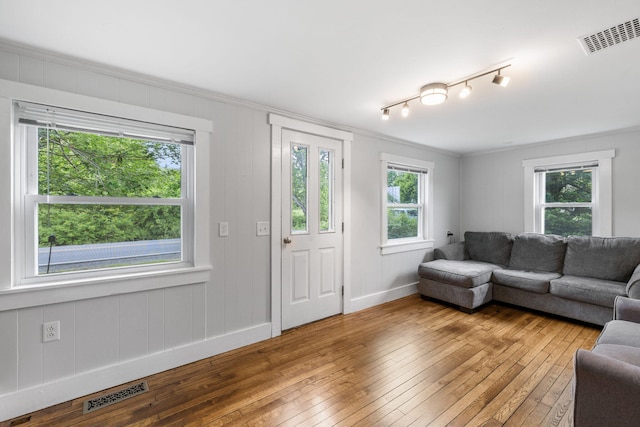 156 Lebanon Rd, North Berwick, ME 03906 - living room with hardwood / wood-style floors, healthy amount of natural light, crown molding, and baseboards