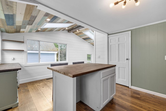 156 Lebanon Rd, North Berwick, ME 03906 - kitchen featuring wooden counters, light wood finished floors, a skylight, wood walls, and open shelves