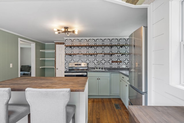 156 Lebanon Rd, North Berwick, ME 03906 - kitchen with wooden counters, stainless steel appliances, open shelves, a sink, and ornamental molding