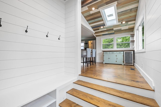 156 Lebanon Rd, North Berwick, ME 03906 - mudroom with a skylight, wine cooler, lofted ceiling, and wood finished floors