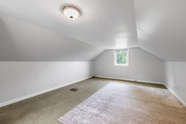 156 Lebanon Rd, North Berwick, ME 03906 - additional living space with carpet flooring, vaulted ceiling, and baseboards