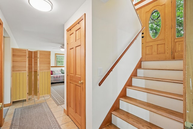 76 Bunny St, Augusta, ME 04330 - stairway featuring ceiling fan and tile patterned floors