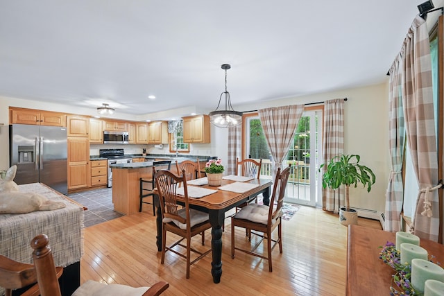 76 Bunny St, Augusta, ME 04330 - dining space featuring light wood-style flooring, baseboard heating, and recessed lighting