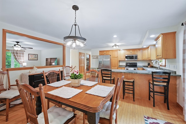 76 Bunny St, Augusta, ME 04330 - dining space featuring light wood-type flooring, recessed lighting, and a baseboard radiator