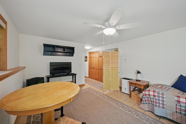 76 Bunny St, Augusta, ME 04330 - living area with light tile patterned floors and a ceiling fan