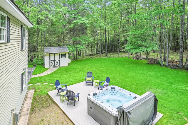 76 Bunny St, Augusta, ME 04330 - view of grassy yard featuring a wooden deck, a hot tub, and a view of trees