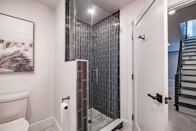 156 Oxford St, Portland, ME 04101 - full bath featuring toilet, baseboards, and a stall shower