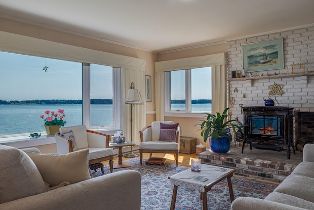463 Seawall Rd, Southwest Harbor, ME 04679 - living area featuring a water view, ornamental molding, and wood finished floors