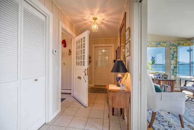 463 Seawall Rd, Southwest Harbor, ME 04679 - corridor featuring light tile patterned flooring, lofted ceiling, and a baseboard heating unit