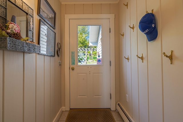 463 Seawall Rd, Southwest Harbor, ME 04679 - entryway with light tile patterned floors and a baseboard heating unit