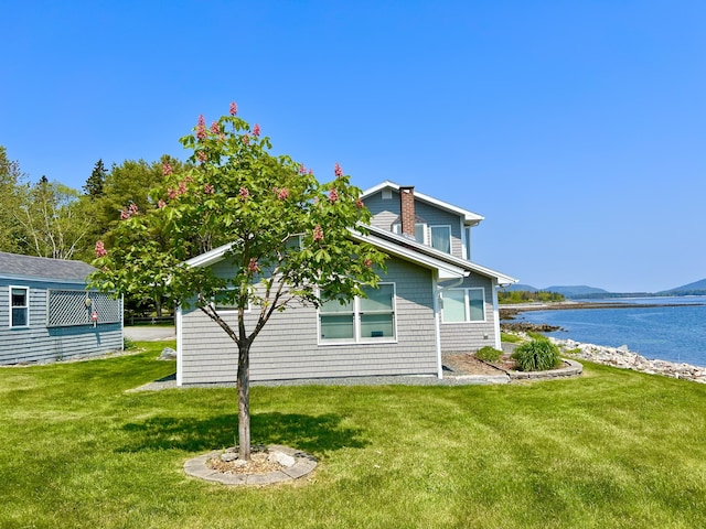 463 Seawall Rd, Southwest Harbor, ME 04679 - rear view of property featuring a yard and a water and mountain view