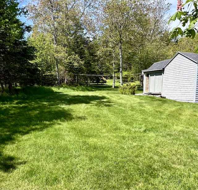 463 Seawall Rd, Southwest Harbor, ME 04679 - view of grassy yard featuring a storage unit
