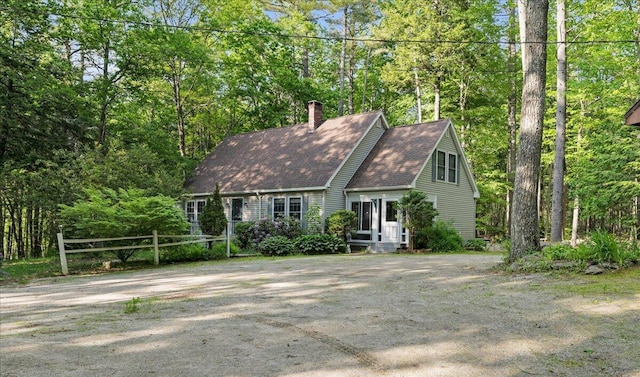 21 Heritage Ln, Orland, ME 04472 - new england style home featuring a chimney