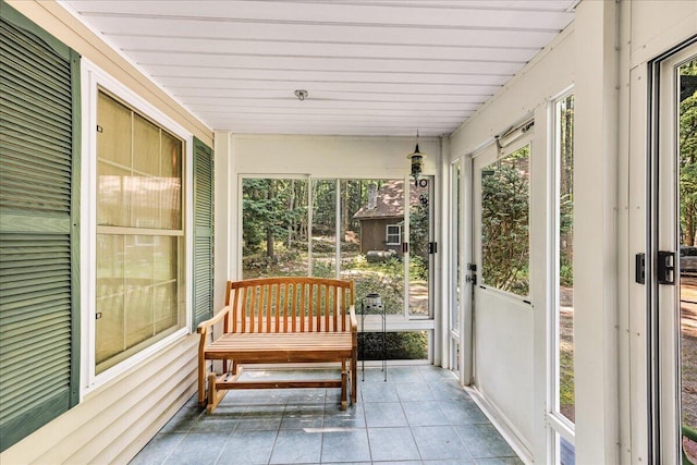 21 Heritage Ln, Orland, ME 04472 - sunroom featuring tile patterned floors