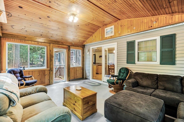 21 Heritage Ln, Orland, ME 04472 - living room featuring wood walls, vaulted ceiling, and wooden ceiling