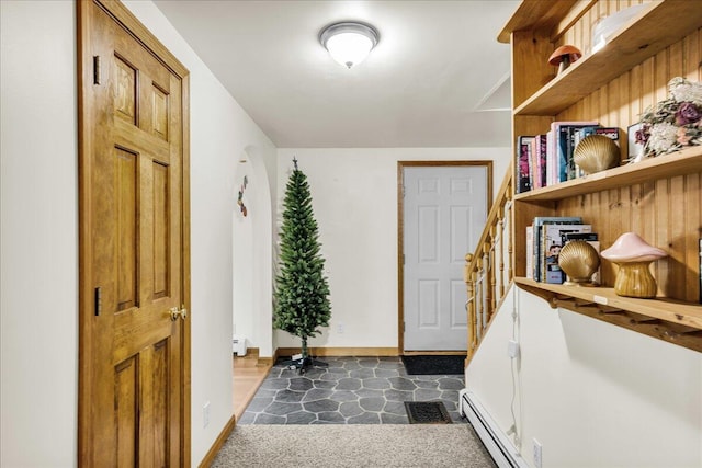 21 Heritage Ln, Orland, ME 04472 - entrance foyer featuring a baseboard radiator and stairs