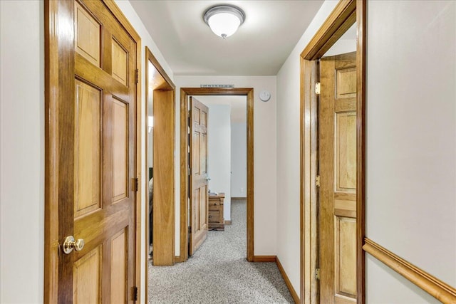21 Heritage Ln, Orland, ME 04472 - hall featuring light colored carpet and baseboards