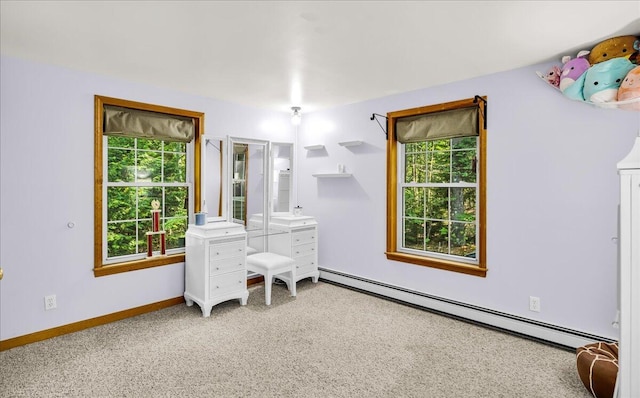 21 Heritage Ln, Orland, ME 04472 - home office featuring baseboard heating, healthy amount of natural light, and carpet