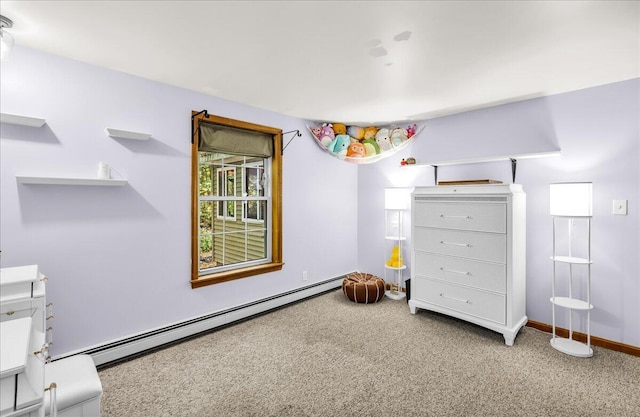 21 Heritage Ln, Orland, ME 04472 - bedroom with a baseboard heating unit and carpet flooring