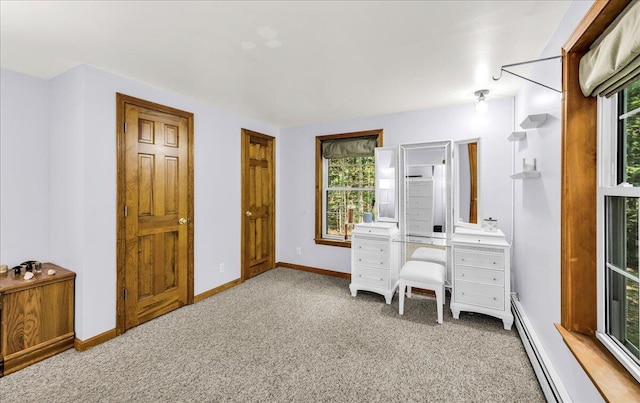 21 Heritage Ln, Orland, ME 04472 - carpeted office with a baseboard heating unit and baseboards