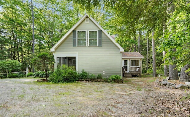 21 Heritage Ln, Orland, ME 04472 - view of side of property featuring a wooden deck