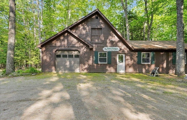 21 Heritage Ln, Orland, ME 04472 - view of front facade featuring a garage and driveway
