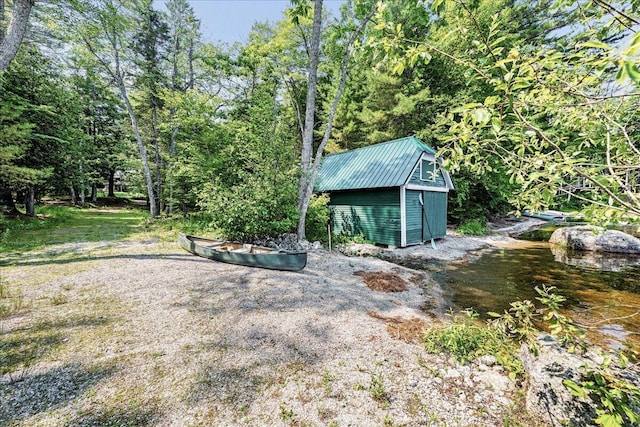 21 Heritage Ln, Orland, ME 04472 - view of yard featuring a storage shed