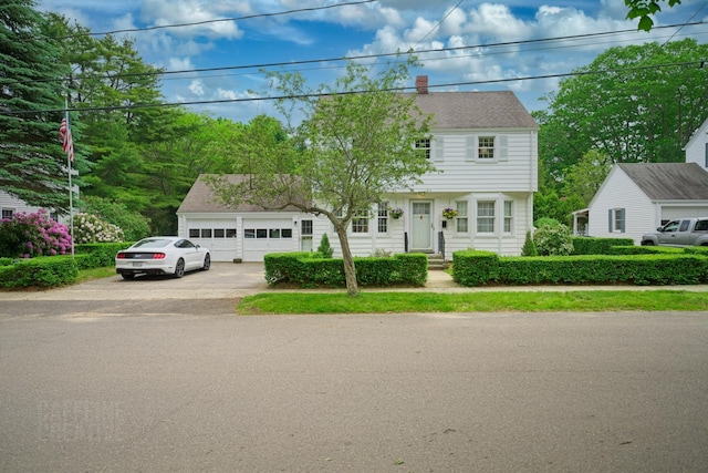 42 Sylvan Rd, South Portland, ME 04106 - colonial home featuring a chimney and a detached garage