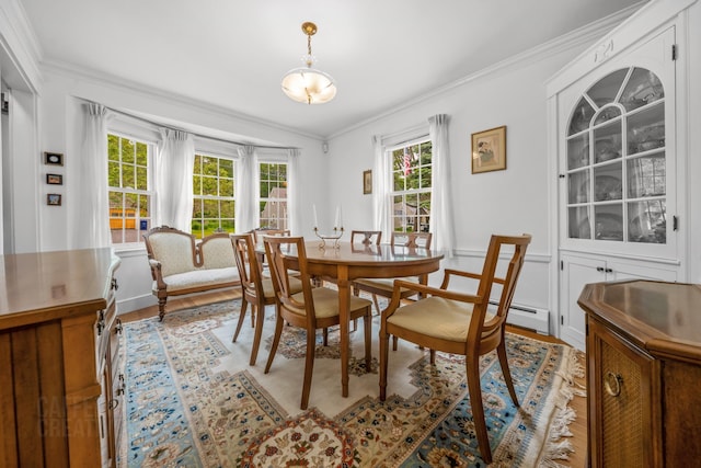 42 Sylvan Rd, South Portland, ME 04106 - dining space featuring crown molding, light wood-style floors, and plenty of natural light