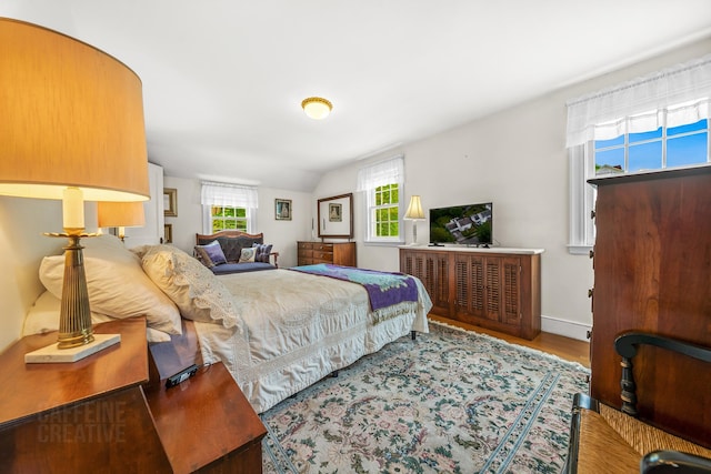 42 Sylvan Rd, South Portland, ME 04106 - bedroom with wood finished floors and baseboards